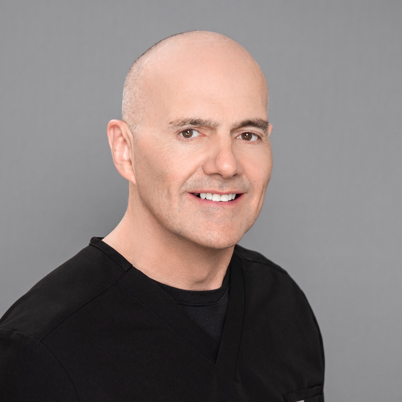 Dr. Michael McGuiness, a board-certified Dermatologist near Frisco who can diagnose all type of skin abnormalities and concerns.