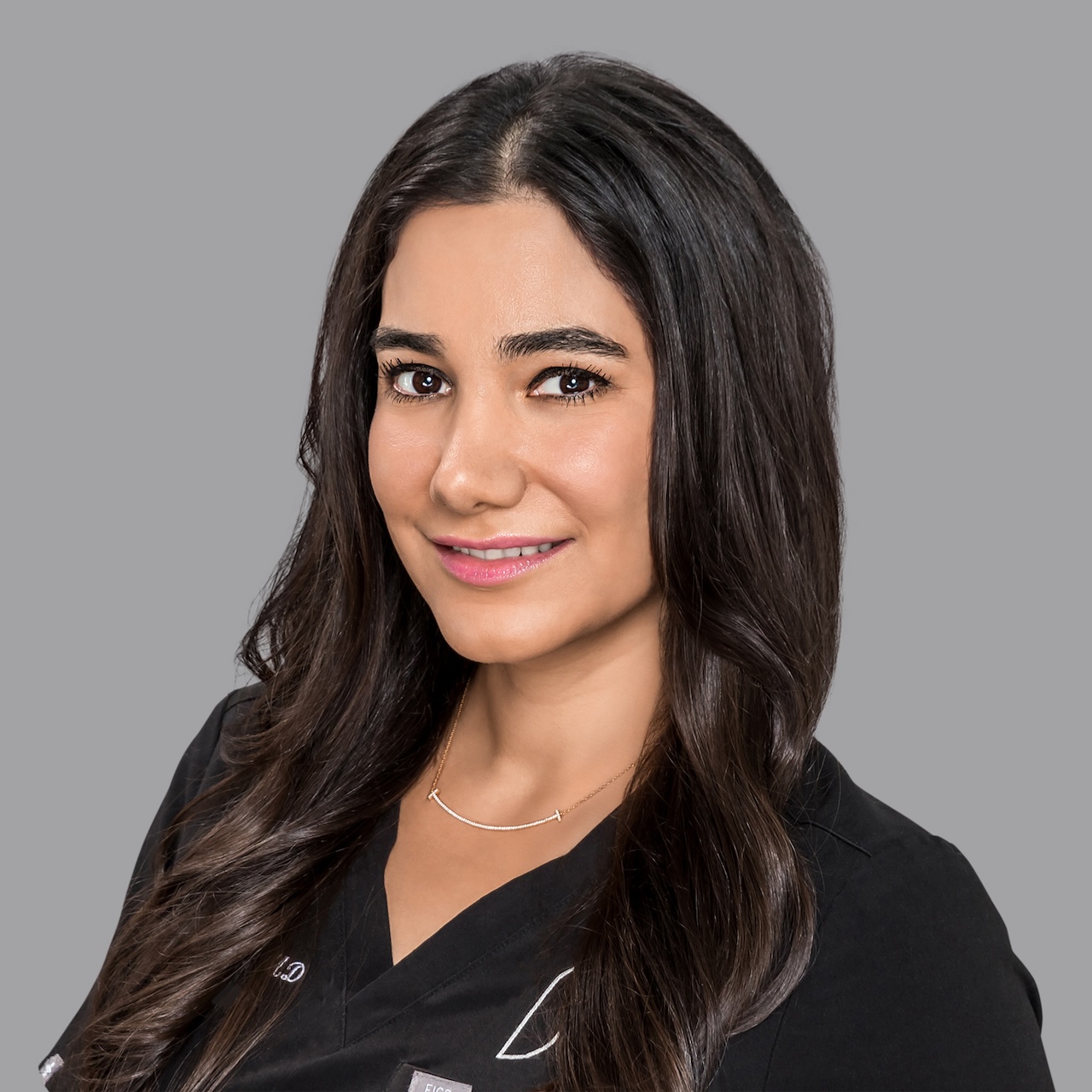 A portrait of Dr. Natalie Barton. She is is a highly skilled expert for any plastic surgery in Plano available at McGuiness.